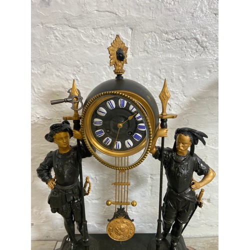 183 - A French Japy Freres gilded spelter figural two train clock with glass dome, pendulum and key on ebo... 