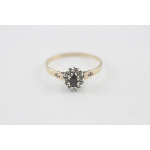 2050 - A 9ct gold diamond and sapphire oval cluster ring - approx. gross weight 1.7g