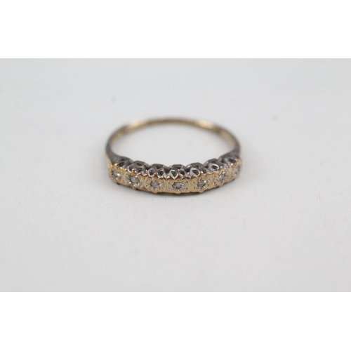 2053 - A 9ct gold diamond half eternity ring - approx. gross weight 1.3g