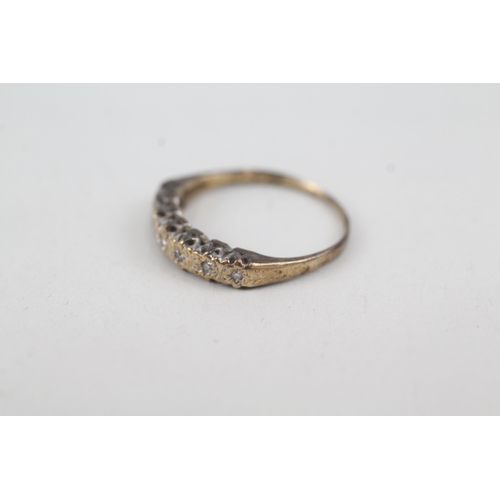 2053 - A 9ct gold diamond half eternity ring - approx. gross weight 1.3g