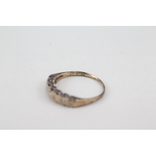 2053 - A 9ct gold diamond half eternity ring - approx. gross weight 1.3g