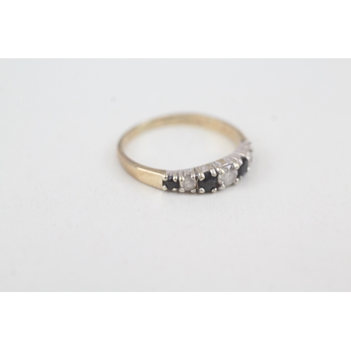 2054 - A 9ct gold sapphire and cubic zirconia half eternity ring - approx. gross weight 1.4g