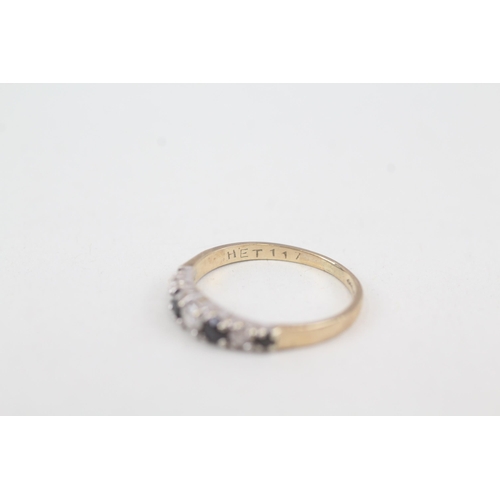 2054 - A 9ct gold sapphire and cubic zirconia half eternity ring - approx. gross weight 1.4g