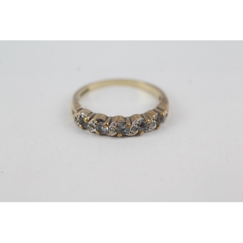 2061 - A 9ct gold blue topaz and diamond half eternity ring - approx. gross weight 2.1g