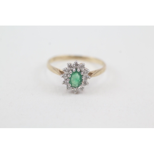 2072 - A 9ct gold emerald and cubic zirconia halo ring - approx. gross weight 1.4g