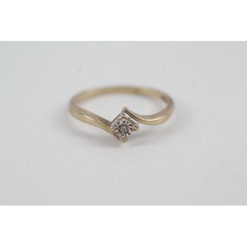 2074 - A 9ct gold diamond solitaire ring - approx. gross weight 1.9g