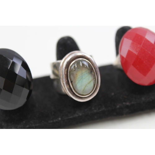 2082 - Four sterling silver gemstone set cocktail rings - approx. gross weight 75g