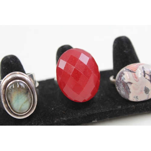 2082 - Four sterling silver gemstone set cocktail rings - approx. gross weight 75g