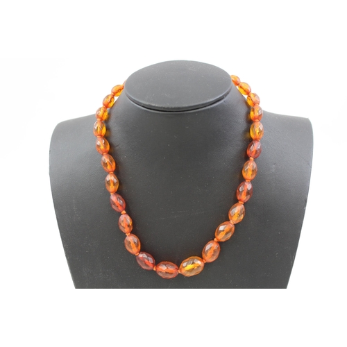 2085 - An antique amber beaded necklace with .925 silver clasp - approx. gross weight 14g