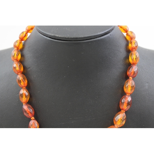 2085 - An antique amber beaded necklace with .925 silver clasp - approx. gross weight 14g