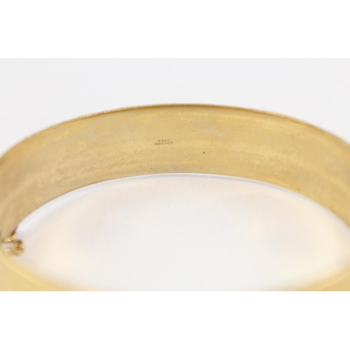 2087 - A vintage 9ct rolled gold bangle - approx. gross weight 30g