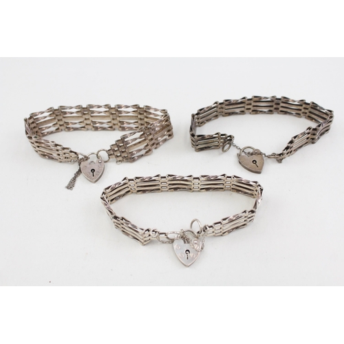 2091 - Three .925 silver gate bracelets with heart shaped clasps - approx. gross weight 47g