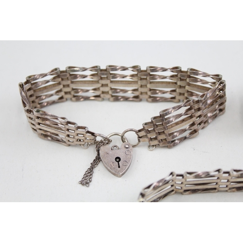 2091 - Three .925 silver gate bracelets with heart shaped clasps - approx. gross weight 47g