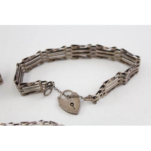 2091 - Three .925 silver gate bracelets with heart shaped clasps - approx. gross weight 47g