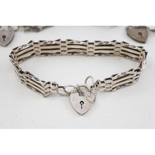 2091 - Three .925 silver gate bracelets with heart shaped clasps - approx. gross weight 47g