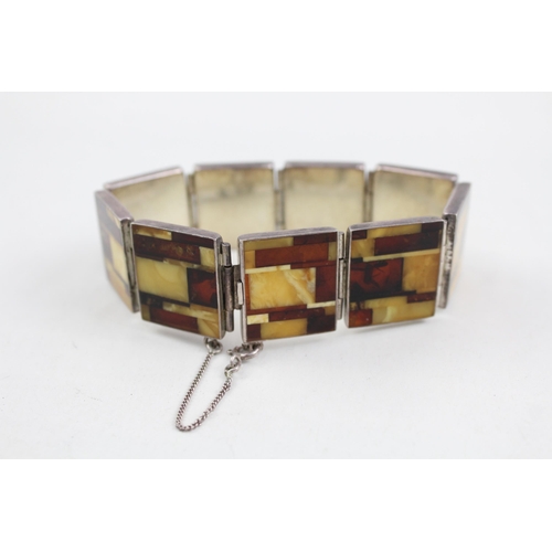 2092 - A sterling silver butterscotch amber set panel bracelet - approx. gross weight 30g