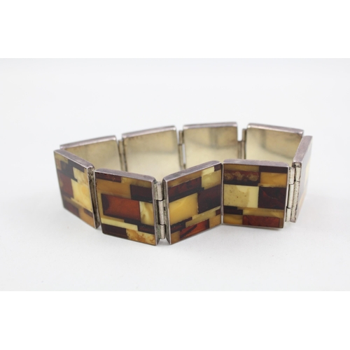 2092 - A sterling silver butterscotch amber set panel bracelet - approx. gross weight 30g