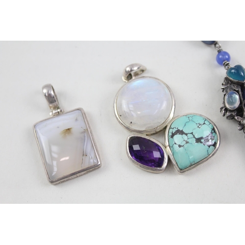 2097 - Five sterling silver gemstone set pendants to include lapis lazuli, moonstone etc. - approx. gross w... 