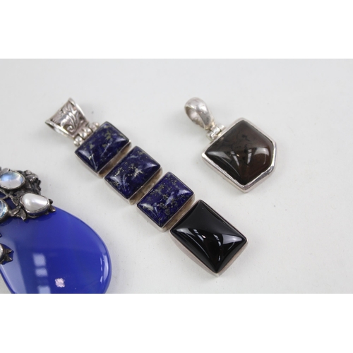 2097 - Five sterling silver gemstone set pendants to include lapis lazuli, moonstone etc. - approx. gross w... 