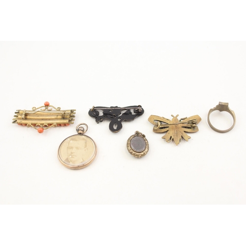 2102 - Six pieces of antique jewellery to include coral set brooch, mourning locket etc.