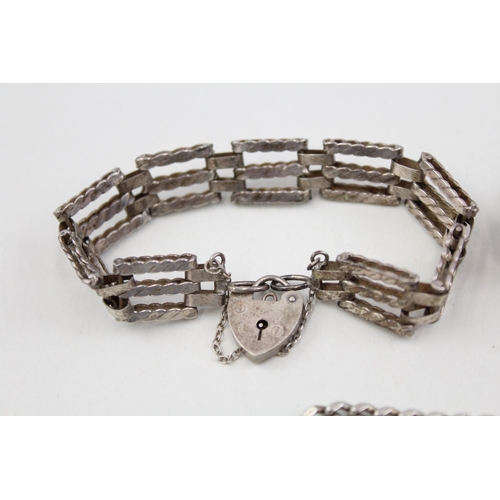 2104 - Three .925 sterling silver gate bracelets with heart shaped clasps - approx. gross weight 57g