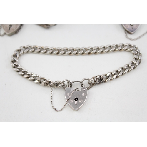 2104 - Three .925 sterling silver gate bracelets with heart shaped clasps - approx. gross weight 57g