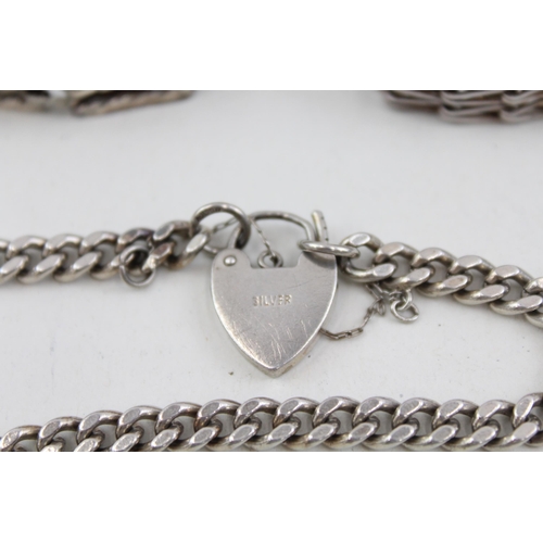 2104 - Three .925 sterling silver gate bracelets with heart shaped clasps - approx. gross weight 57g