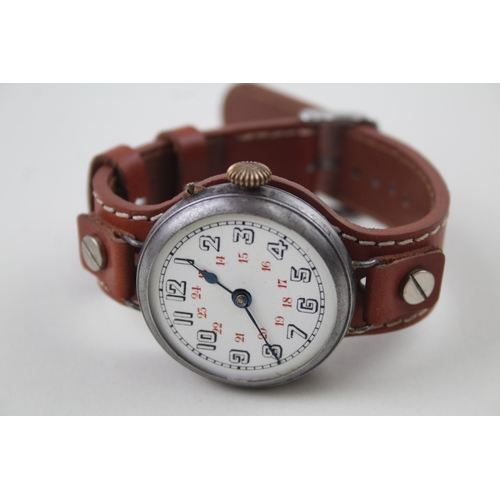 2176 - An early 20th century hand wind men's trench watch