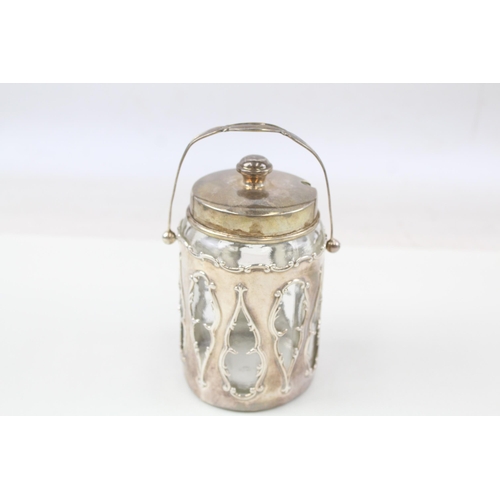 2189 - A .925 sterling silver and glass jar and cover