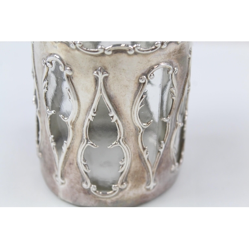 2189 - A .925 sterling silver and glass jar and cover