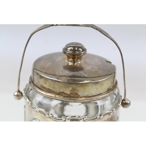 2189 - A .925 sterling silver and glass jar and cover