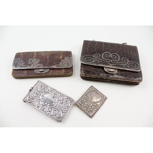 2192 - Four hallmarked sterling silver detailed items, two coin purses and two notebooks