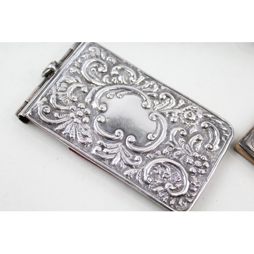 2192 - Four hallmarked sterling silver detailed items, two coin purses and two notebooks