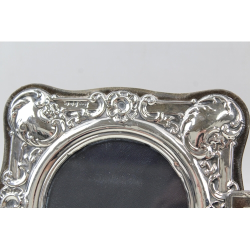 2203 - Three hallmarked sterling silver photo frames - largest approx. 17cm x 17cm