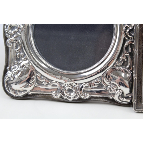 2203 - Three hallmarked sterling silver photo frames - largest approx. 17cm x 17cm