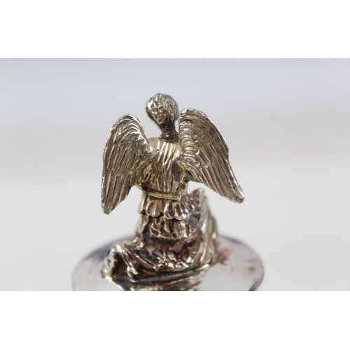 2204 - A hallmarked sterling silver angel topped bottle stopper