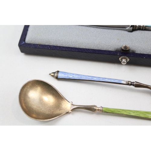 2213 - Three hallmarked sterling silver and guilloche enamel items, two teaspoons and one cased knife