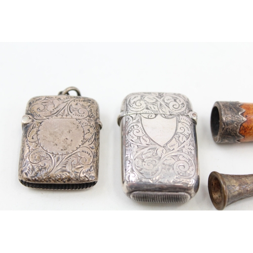 2215 - Five pieces of hallmarked sterling silver tobacciana, two vesta cases, one cigar cutter/knife and tw... 