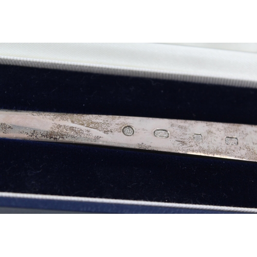 2217 - A boxed hallmarked sterling silver novelty meat skewer letter opener - approx. gross weight 57g