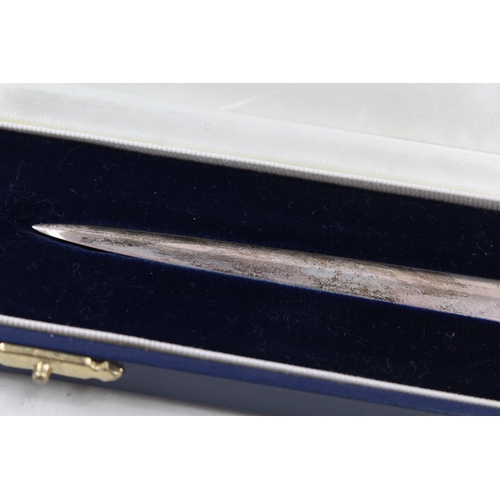 2217 - A boxed hallmarked sterling silver novelty meat skewer letter opener - approx. gross weight 57g