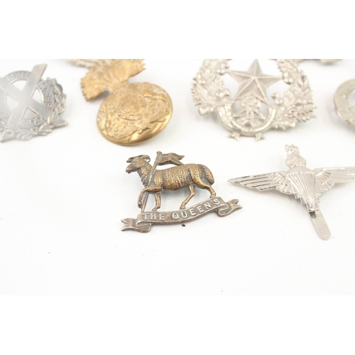 2268 - Ten military cap badges