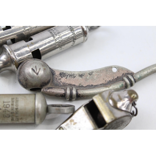 2272 - Six vintage whistles to include 1942 military, Bosuns, ARP, Metropolitan Police etc.