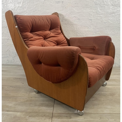 1 - A mid 20th century G Plan teak and fabric upholstered saddleback armchair on castors - approx. 83cm ... 