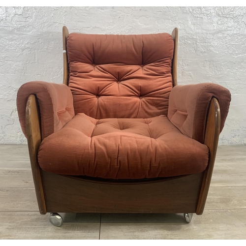 1 - A mid 20th century G Plan teak and fabric upholstered saddleback armchair on castors - approx. 83cm ... 