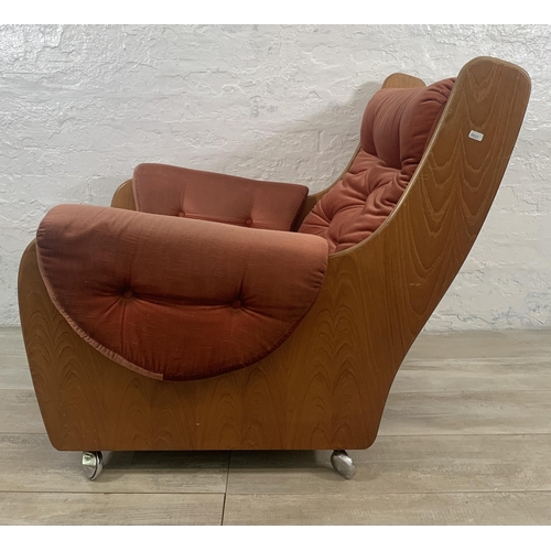 1 - A mid 20th century G Plan teak and fabric upholstered saddleback armchair on castors - approx. 83cm ... 