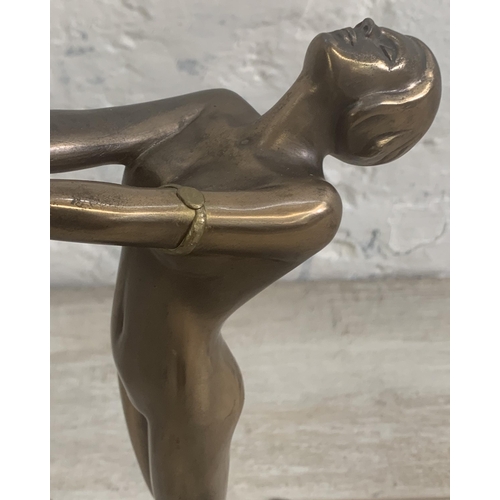 10 - An Art Deco style bronzed nude lady figural table lamp with opaque spherical shade and marble effect... 