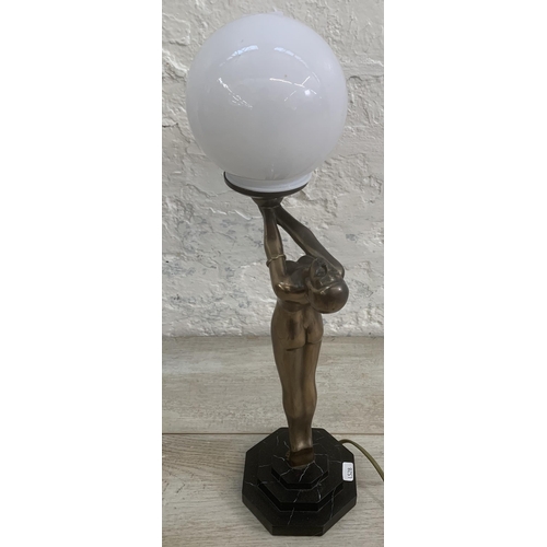 10 - An Art Deco style bronzed nude lady figural table lamp with opaque spherical shade and marble effect... 