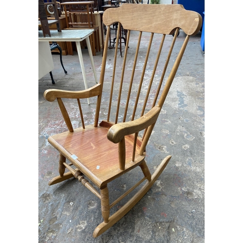 103 - A Victorian style beech spindle back farmhouse rocking chair