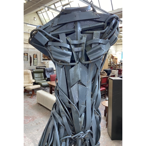 112A - A Neil Wood metal nude male sculpture - approx. 210cm high x 144cm wide x 95cm deep