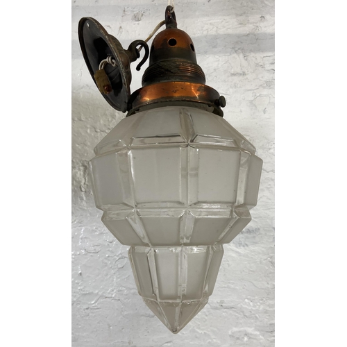 114 - An early 20th century copper and frosted glass pendant light - approx. 36cm high